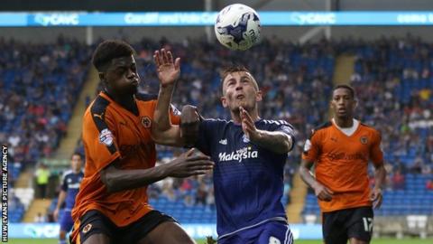 Joe Ralls of Cardiff City and Dominic Iorfa of Wolves