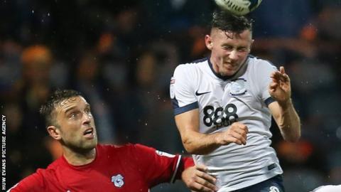 Rickie Lambert (left) challenges Alan Browne