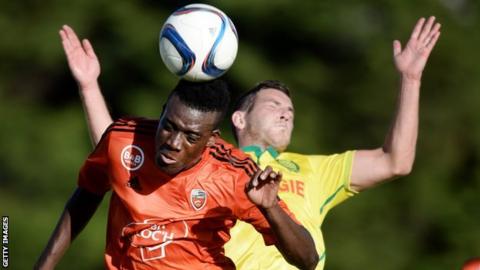Remi Mulumba (left)