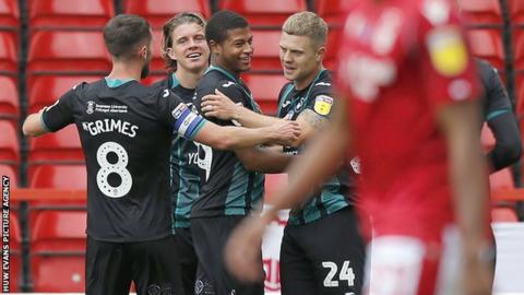 Rhian Brewster celebrates after scoring his ninth goal in 18 Swansea appearances at Nottingham Forest