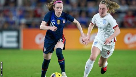 Rose Lavelle (left) playing against England and Manchester City's Keira Walsh at the 2020 SheBelieves Cup