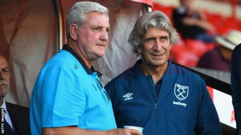 Steve Bruce with Manuel Pellegrini