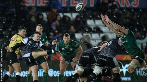 Ospreys' Reuben Morgan-Williams clears the ball