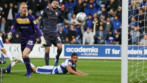 QPR striker Tomer Hemed watches his header put his side 1-0 up against Sheffield Wednesday