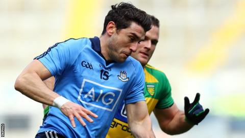 Bernard Brogan battles with Donegal's Neil McGee at Croke Park