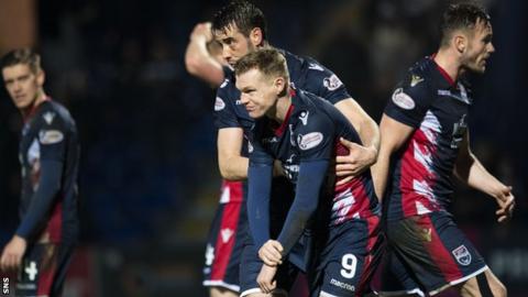 Ross County's Billy Mckay is in pain after scoring a hat-trick