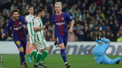 Lionel Messi and Ivan Rakitic