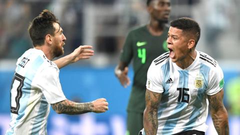 Marcos Rojo and Lionel Messi