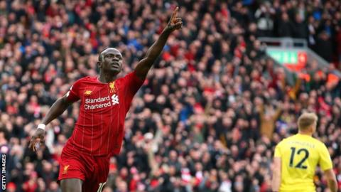 Sadio Mane celebrates scoring for Liverpool