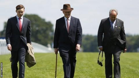 Trainer John Gosden walks the course at Ascot