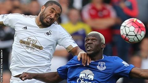 Swansea's Ashley Williams (left) challenges Arouna Kone of Everton during the two sides' 0-0 draw in September 2015