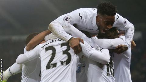 Swansea City celebrate a goal against Leicester City