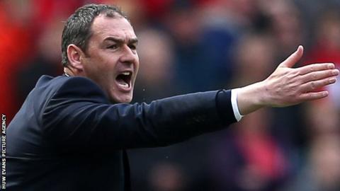 Paul Clement shouts instruction to his Swansea players during a match
