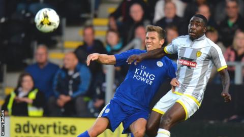 Kelvin Maynard (right) in action against Leicester City's Dean Hammond