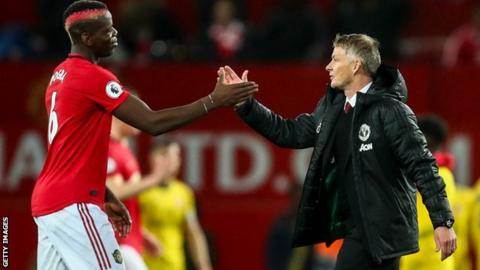 Paul Pogba (left) and Manchester United manager Ole Gunnar Solksjaer