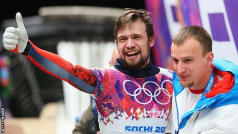 Russia's Alexander Tretiakov celebrates winning gold at Sochi