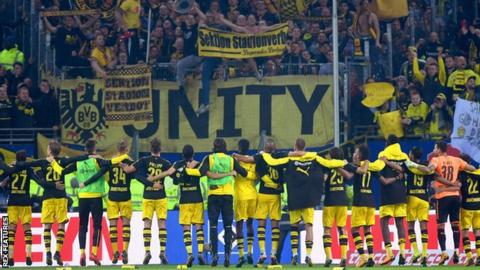 Dortmund players celebrate in front of their fans