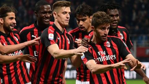 Fabio Borini celebrates his goal for AC Milan