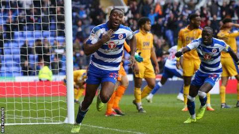 Yakou Meite of Reading celebrates his injury-time winner against Wigan