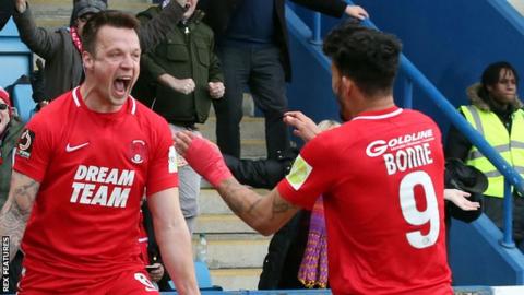 Josh Coulson (left) celebrates after scoring for Leyton Orient in their win against AFC Telford United