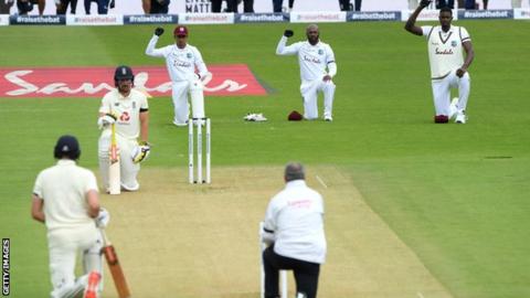 England and West Indies players take a knee