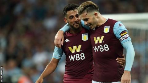 Neil Taylor and Jack Grealish