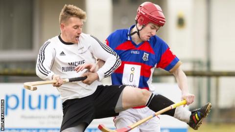 Lovat and Kingussie players contest possession