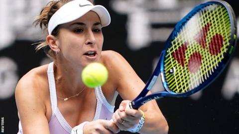 Belinda Bencic plays a backhand in her Australian Open second-round match against Jelena Ostapenko