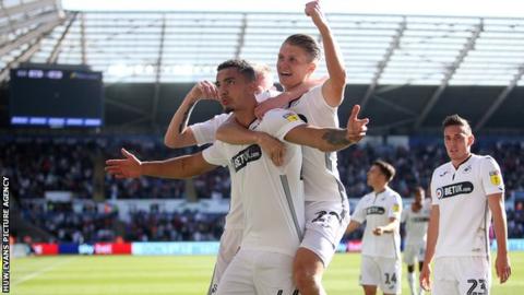 Courtney Baker-Richardson celebrates scoring a goal with George Byers of Swansea City