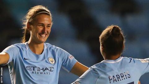 Jill Scott celebrates with Manchester City teammate Nikita Parris