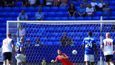 James Norwood of Ipswich Town scores a goal from the penalty spot