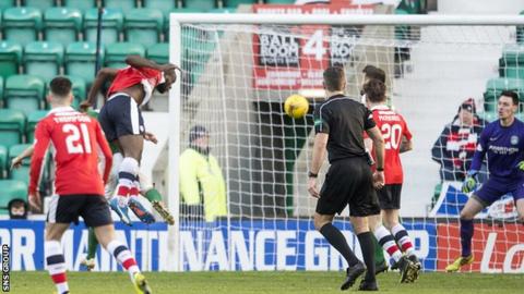 Jean-Yves M'Voto heads Rovers in front at Easter Road