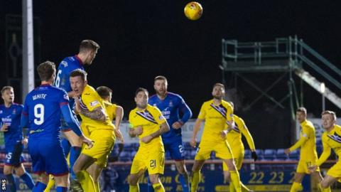 Chris McCart heads in Inverness' second goal