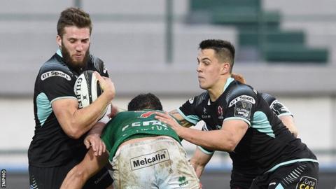 Ulster's Stuart McCloskey and James Hume are tackled by Benetton's Michele Lamaro