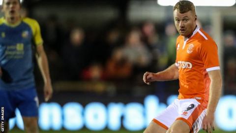 Chris Taylor in action for Blackpool