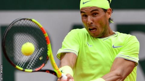 Nadal hits a backhand