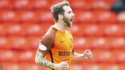 Dundee United's James Keatings celebrates