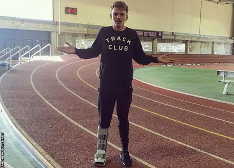 Andrew Butchart with his right foot in a protective boot