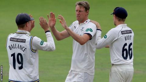 Yorkshire's Steven Patterson celebrates after taking a Lancashire wicket