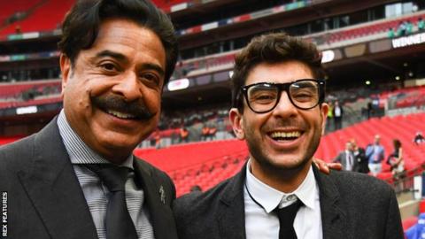 Tony Khan (right) with his father, Fulham owner Shahid Khan