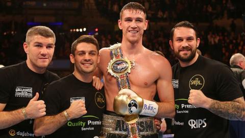 Smith Jr (right) is one of four brothers who have held the British title