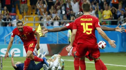 Belgium's Nacer Chadli celebrates scoring the winner against Japan along with Thomas Meunier and Romelu Lukaku