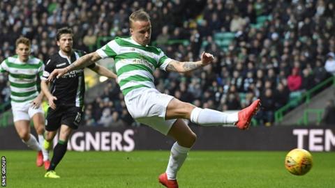 Celtic striker Leigh Griffiths knocks in the opening goal for the champions