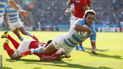 Nicolas Sanchez of Argentina dives over for their third try