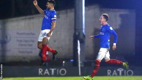 Gareth Evans celebrates Portsmouth's opening goal against Bury