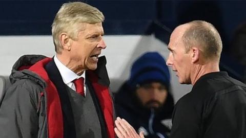 Arsene Wenger and Mike Dean