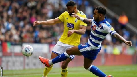 Birmingham striker Isaac Vassell was up against Reading's Liam Moore at the Madejski Stadium