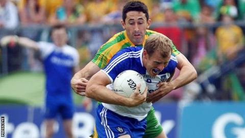 Owen Lennon battles with Donegal's Rory Kavanagh in the 2013 Ulster Football Final