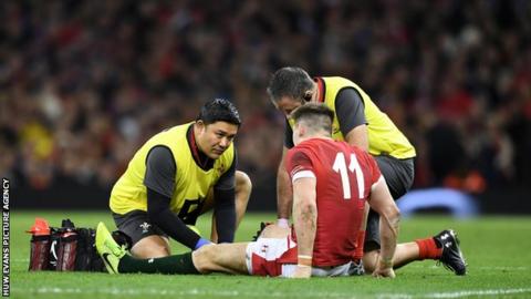 Josh Adams receives treatment against France