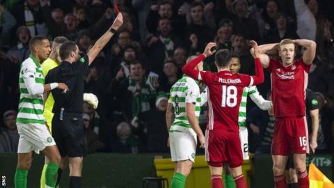 Aberdeen striker Sam Cosgrove (right) was sent off for a challenge on Celtic's Kristoffer AJer